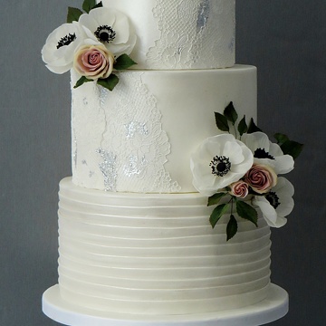 Lace and flower wedding cake