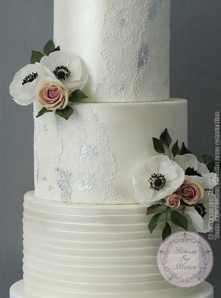 Lace and flower wedding cake